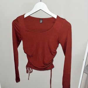 Long sleeve burgundy shirt with ties on both sides